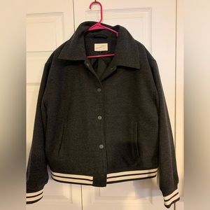 Never worn varsity jacket size women’s XL